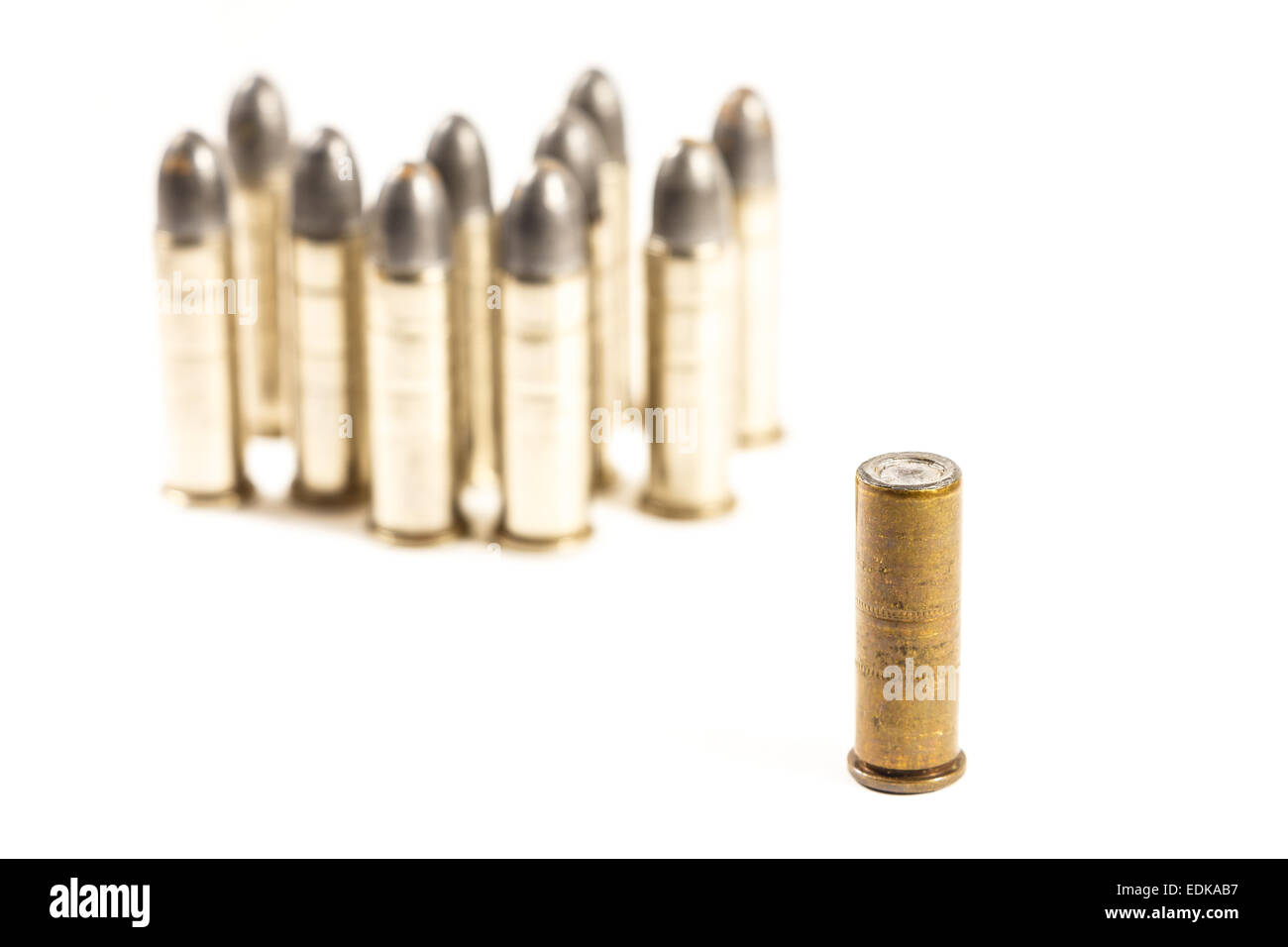 Think different (group of bullets and single bullet on white background) Stock Photo