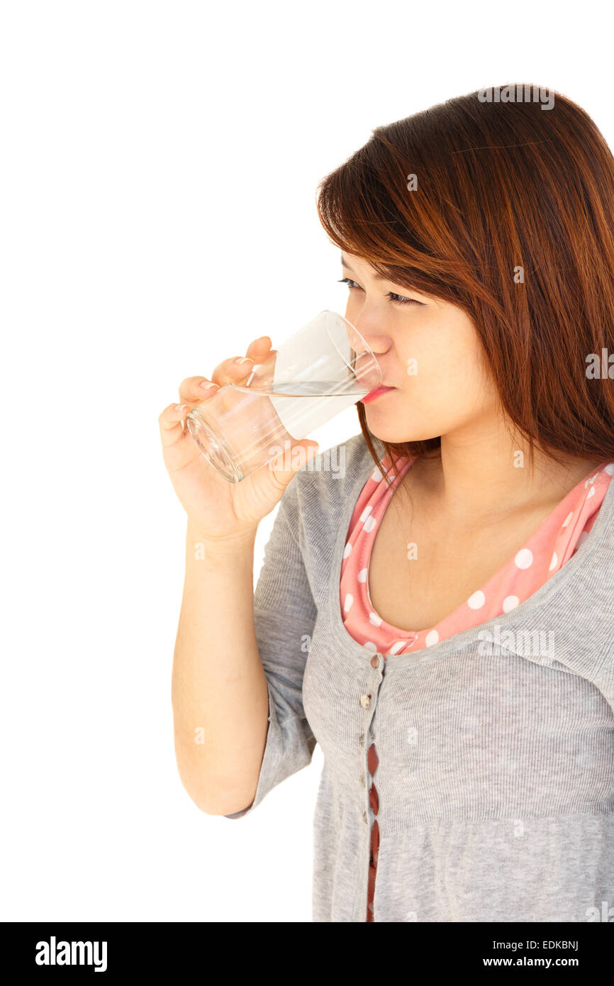 Thai lady is drinking water on white background(isolated) and blank area at left side Stock Photo