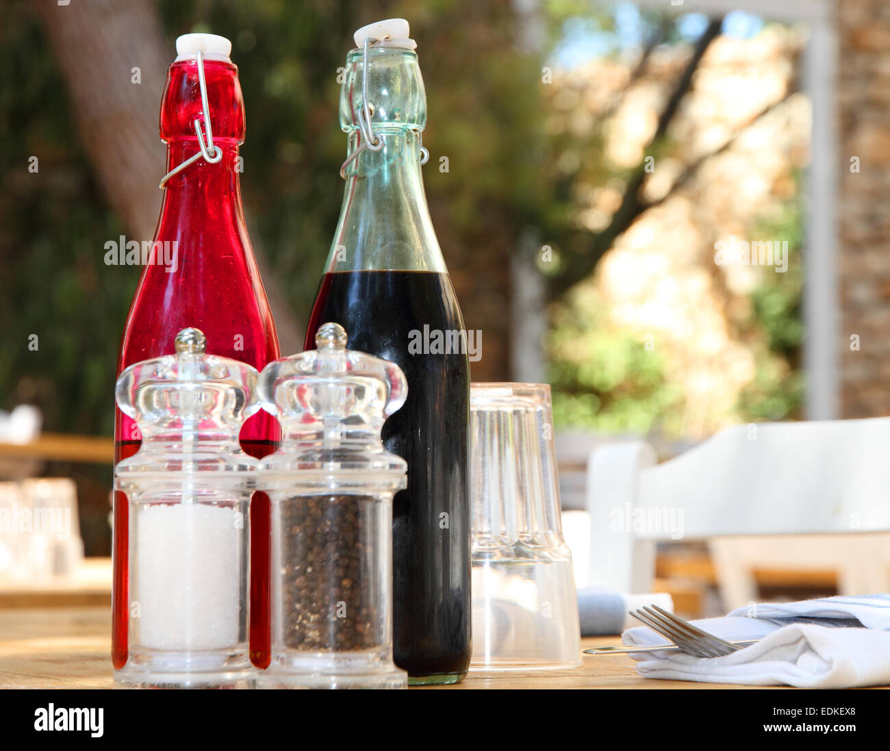 Condiments on alfresco restaurant table Stock Photo Alamy