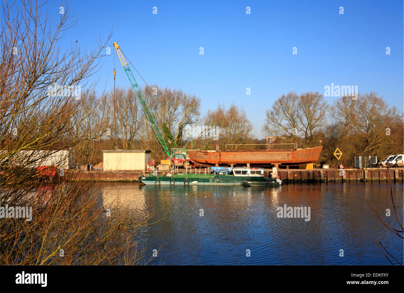 A view of a small boatyard by the River Yare at Thorpe St Andrew