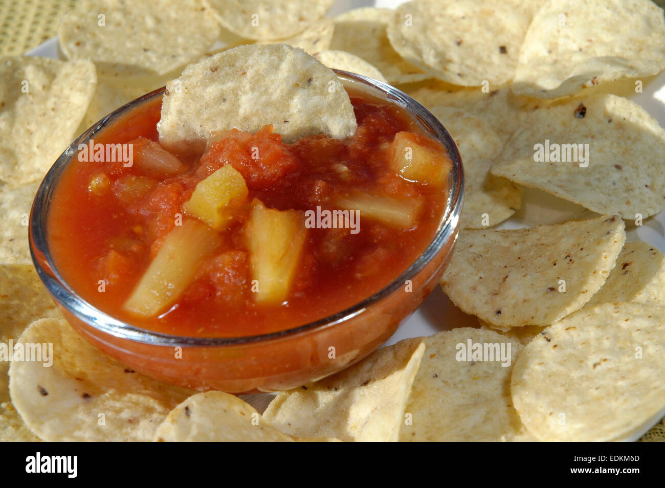 Corn tortilla chips and pineapple salsa Stock Photo Alamy