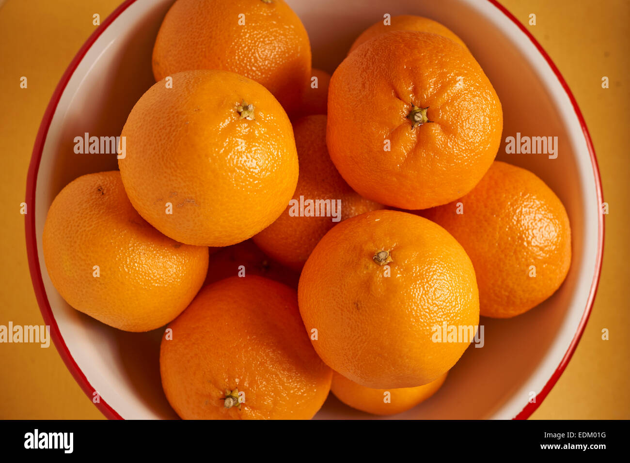 Whole, unpeeled Clementines Stock Photo