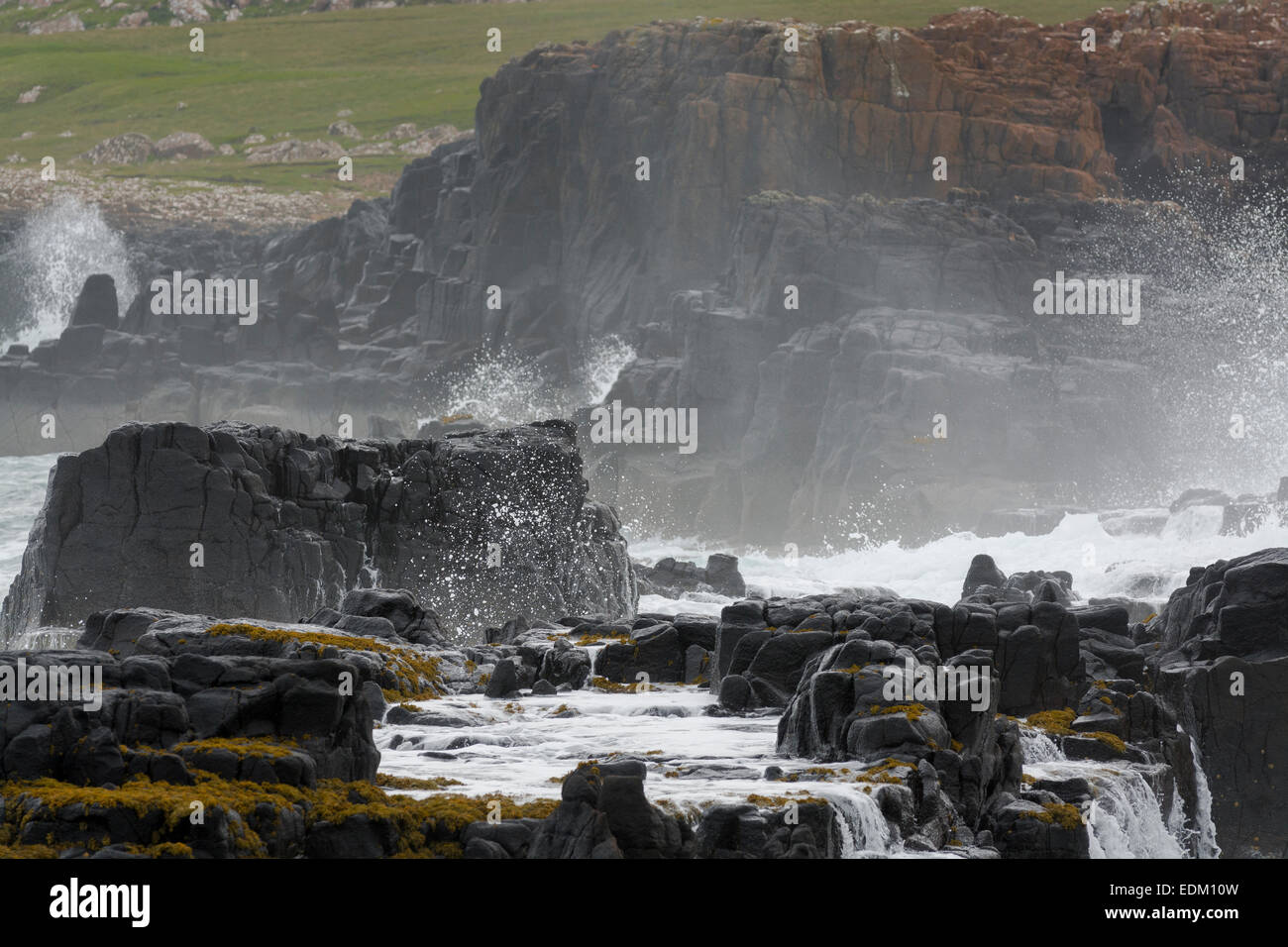 rocks and stormy sea staffin isle of skye Stock Photo