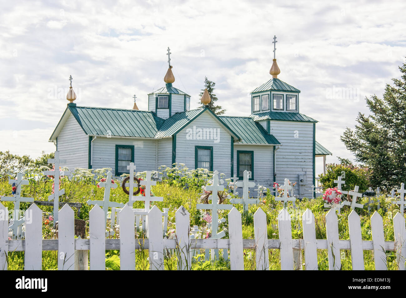 The Holy Transfiguration of our Lord Russian Orthodox Church and graveyard in Ninilchik, Kenai Peninsula, Alaska, USA Stock Photo