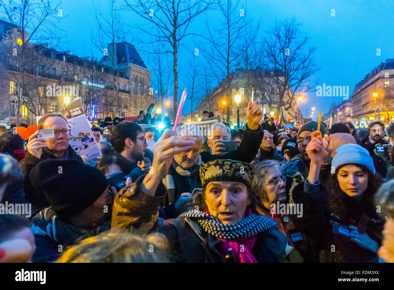 Paris, France, Crowd protest of People Holding Candles, Demonstration Against Terrorism, After Shooting Attack on French Newspaper, Charlie Hebdo, Night, 'je suis Charlie paris' Stock Photo