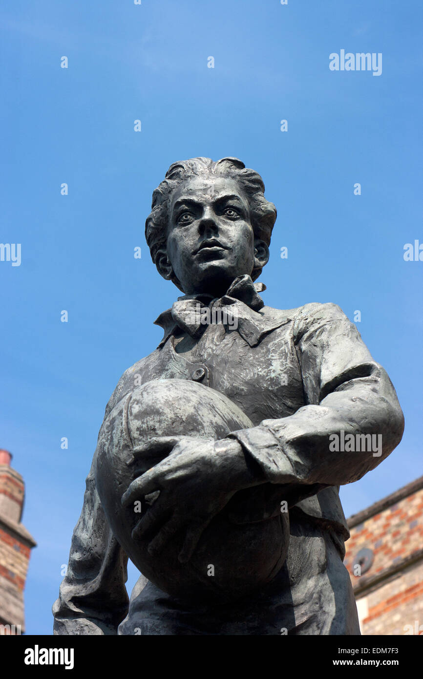 Statue of William Webb Ellis outside Rugby School, Rugby, Warwickshire Stock Photo