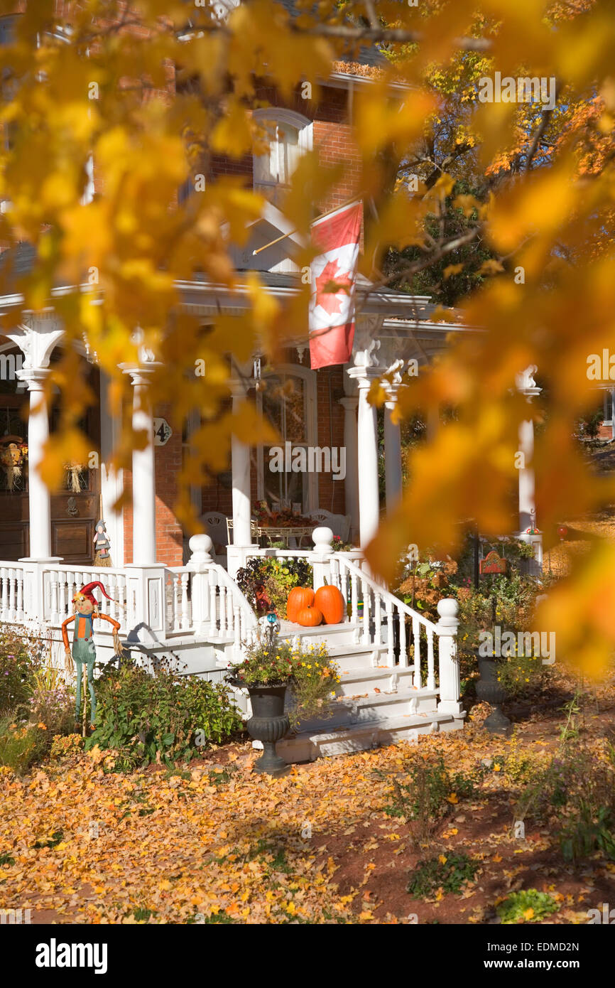 Front porch of house in fall Stock Photo