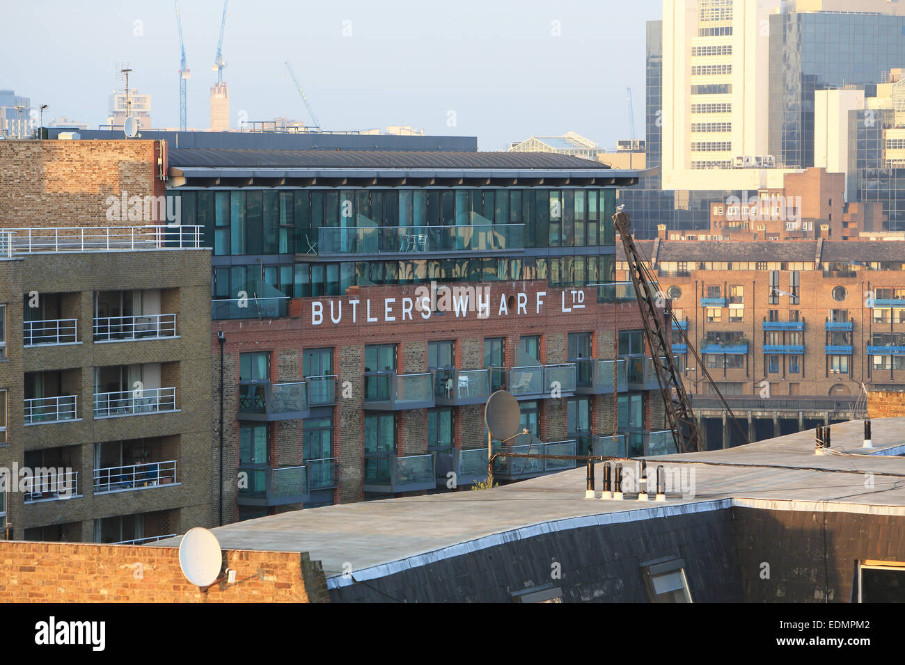 Butler's Wharf, formerly a historic building, now luxury apartments. overlooking the River Thames, in Southwark, SE London, UK Stock Photo