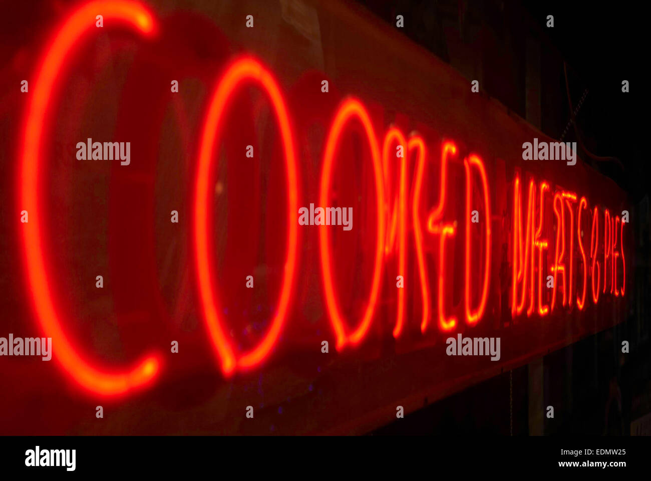 cooked meats and pies sign / neon food sign Stock Photo