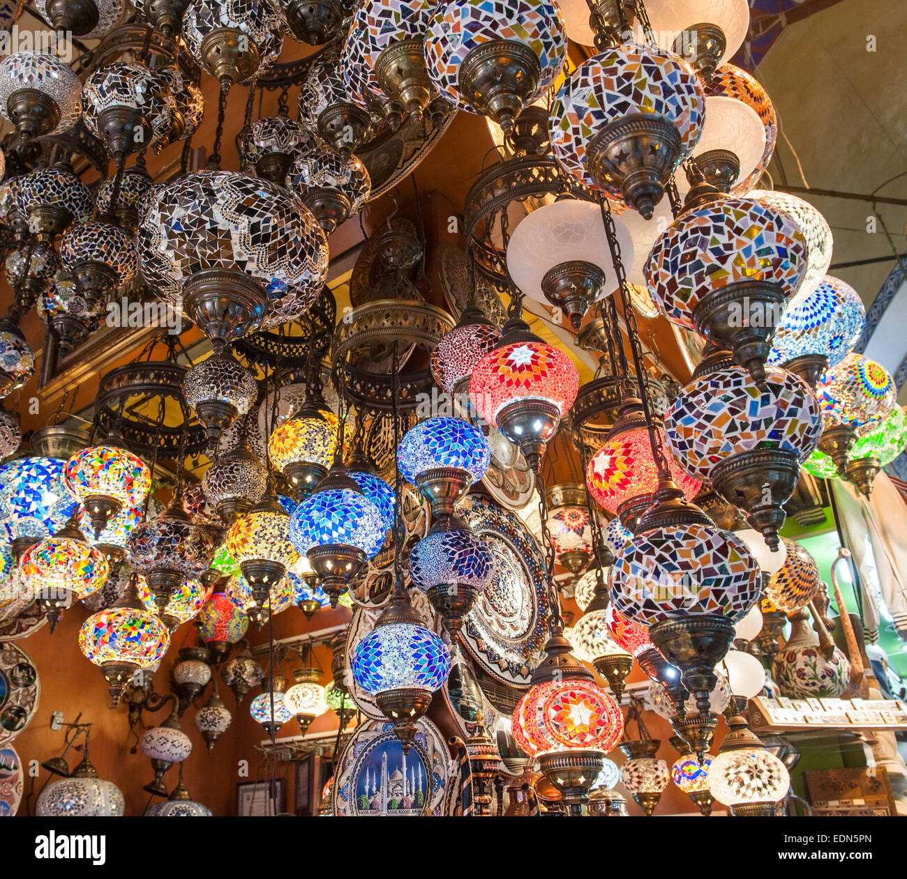 Ornate glass ceiling lights hanging at a bazaar market souk stall Stock Photo