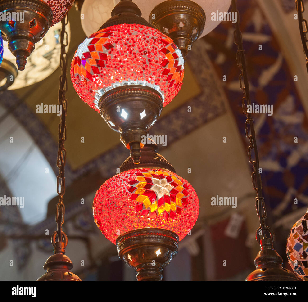 Ornate glass ceiling lights hanging at a bazaar market souk stall Stock Photo