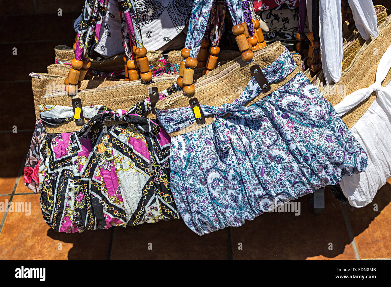 Handbags on sale in sea front shop, Playa Blanca, Lanzarote, Canary Islands, Spain Stock Photo
