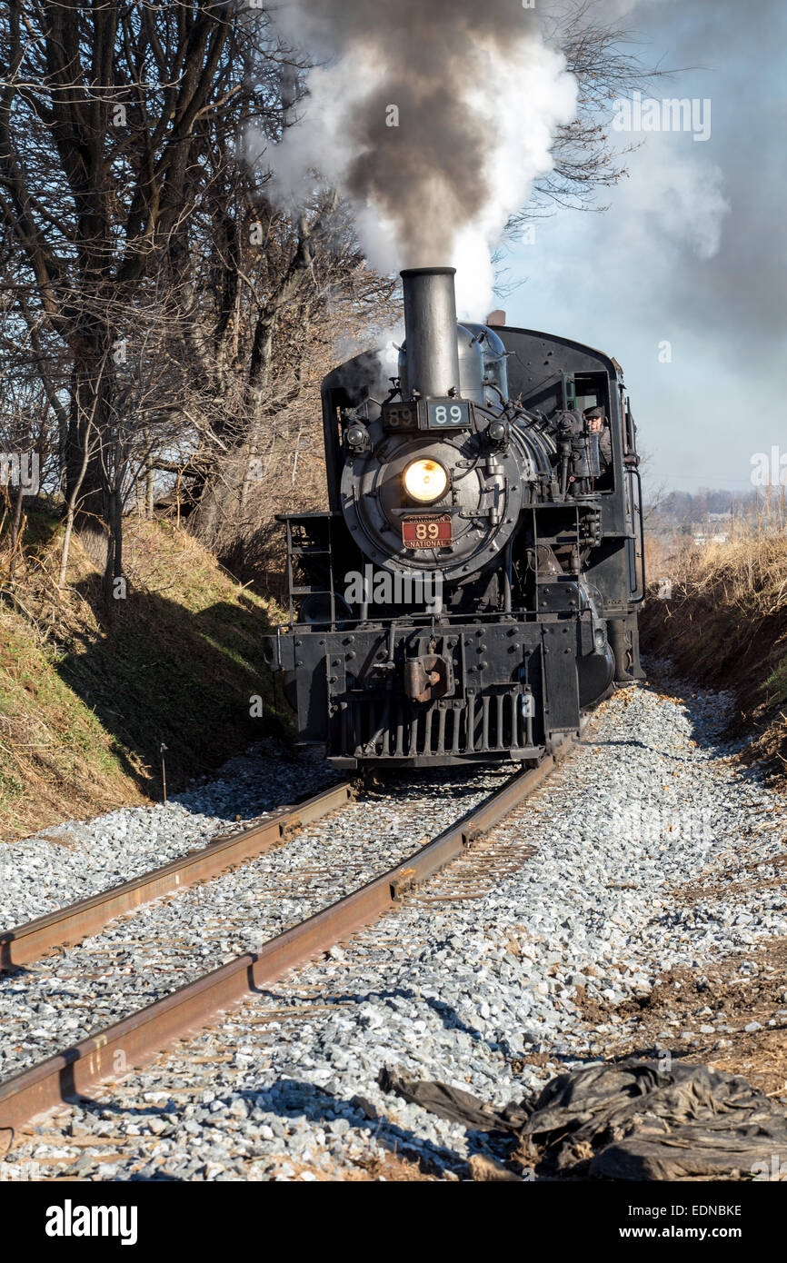 A steam locomotive from the Strasburg Rail Road chugs through Lancaster County, PA. Stock Photo