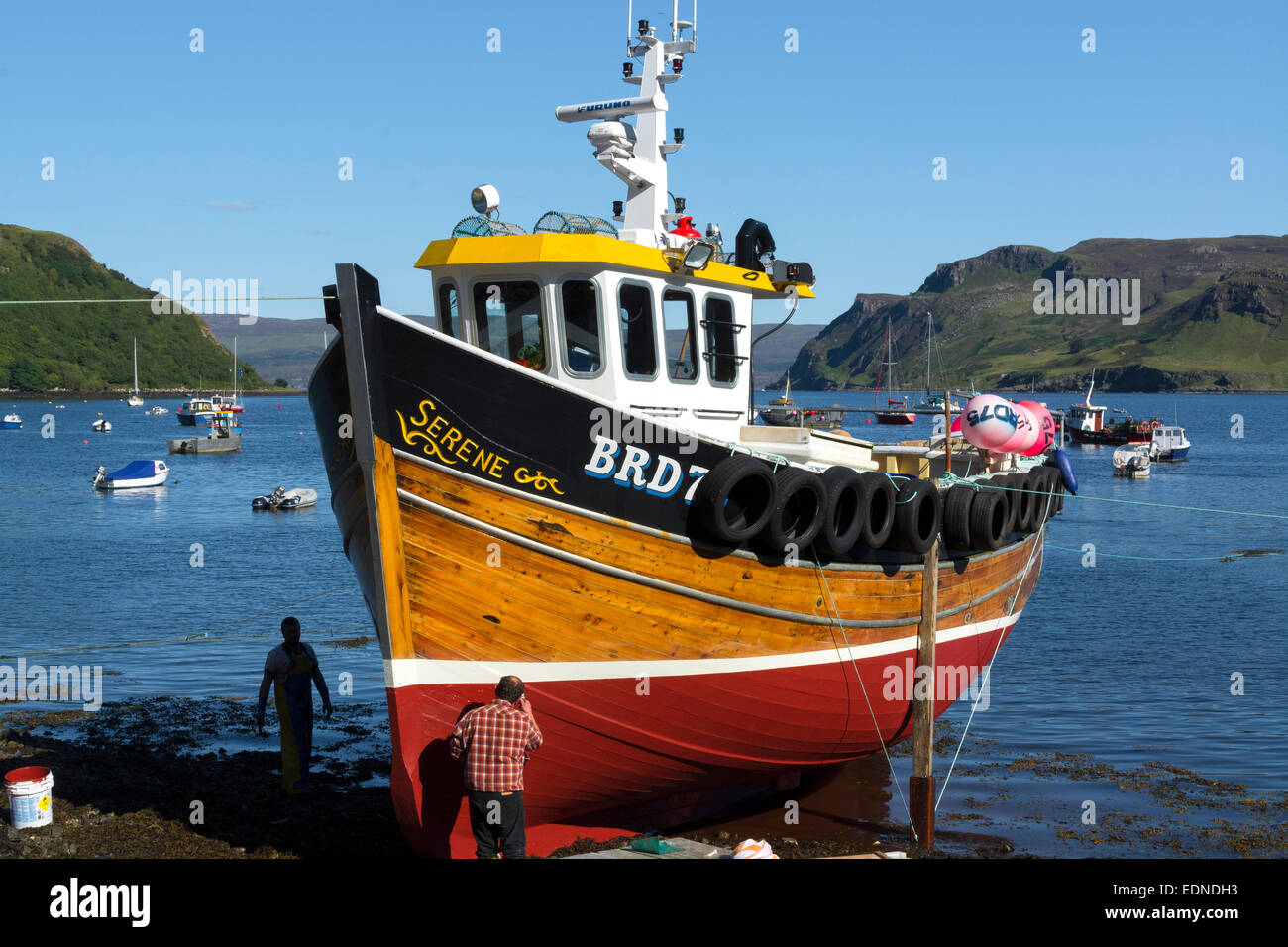 refurbishing a traditional fishing boat at portree skye Stock Photo