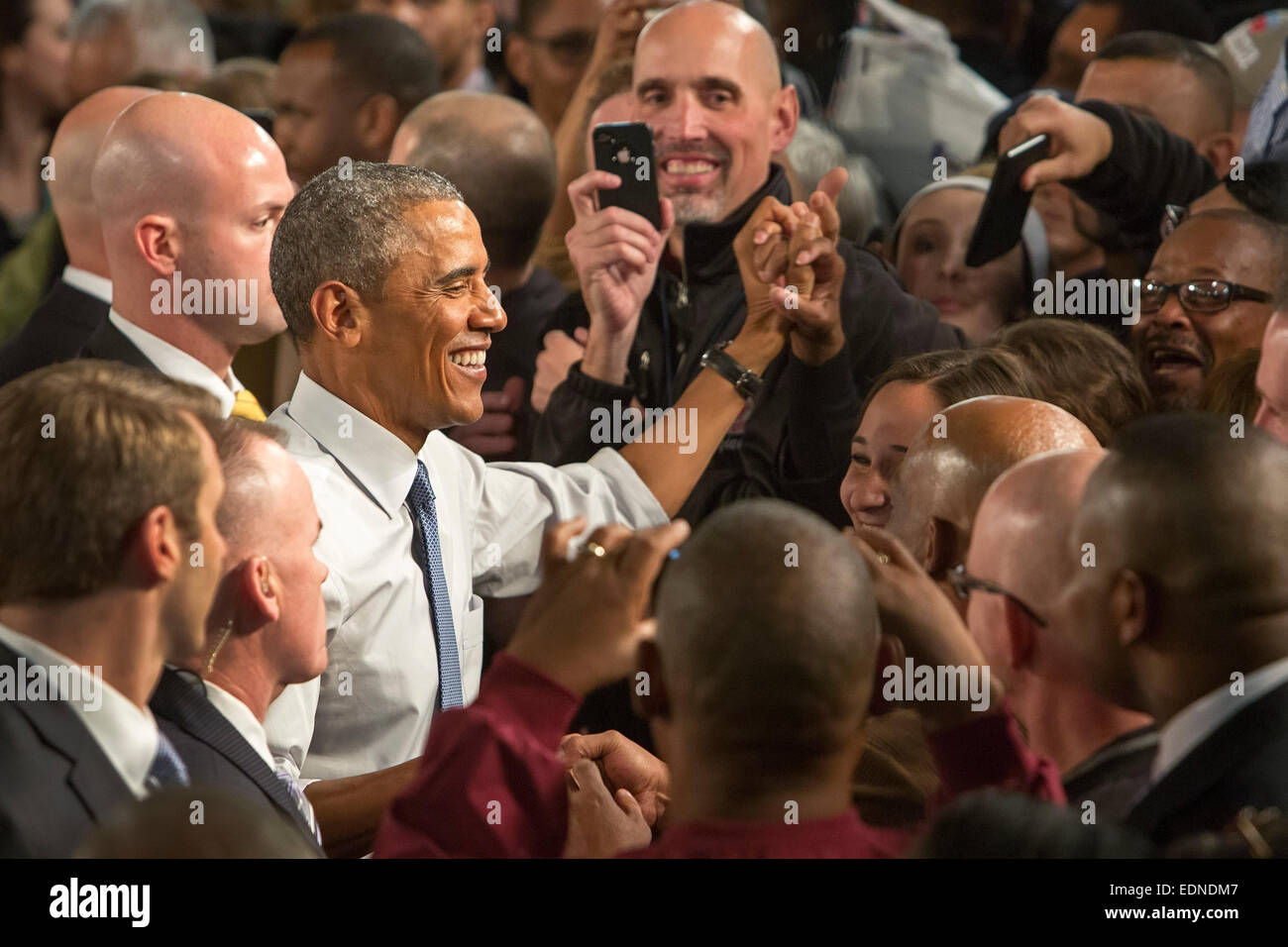 Wayne, Michigan, USA. President Barack Obama shakes hands following a speech at Ford's Michigan Assembly Plant. Obama celebrated car manufacturers' resurgence since the 2009 government bailout of the auto industry. Credit:  Jim West/Alamy Live News Stock Photo