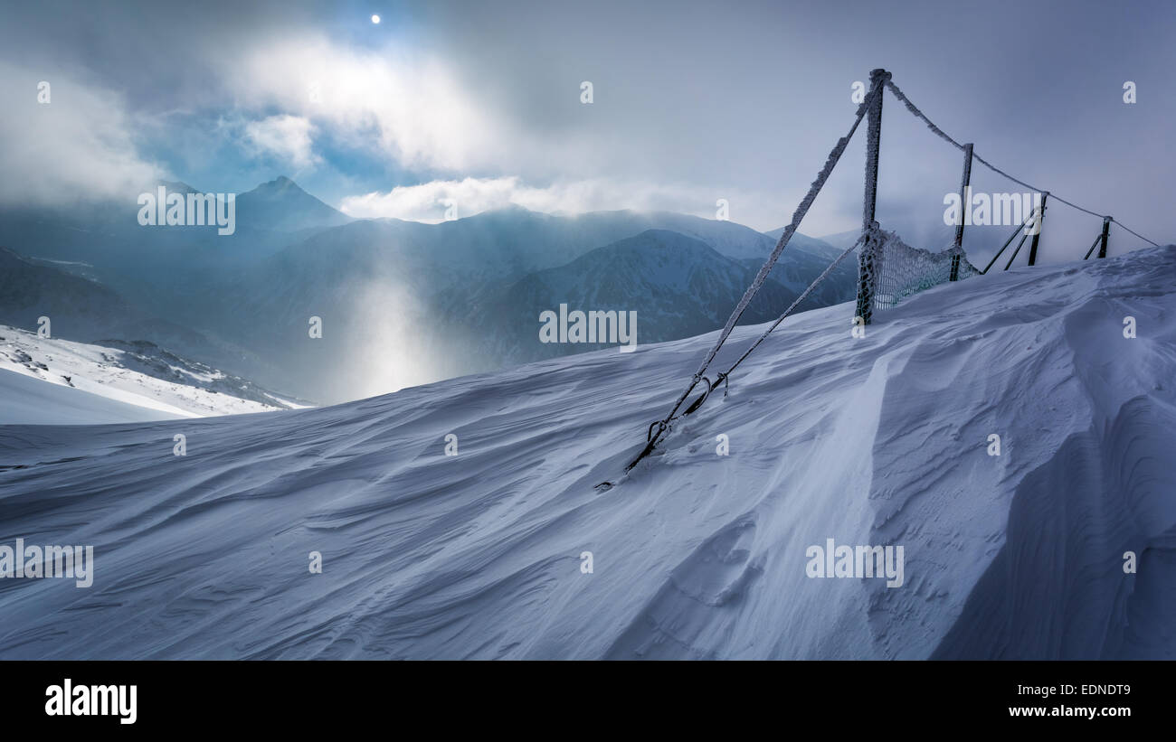 Mountain peaks covered with snow Stock Photo - Alamy
