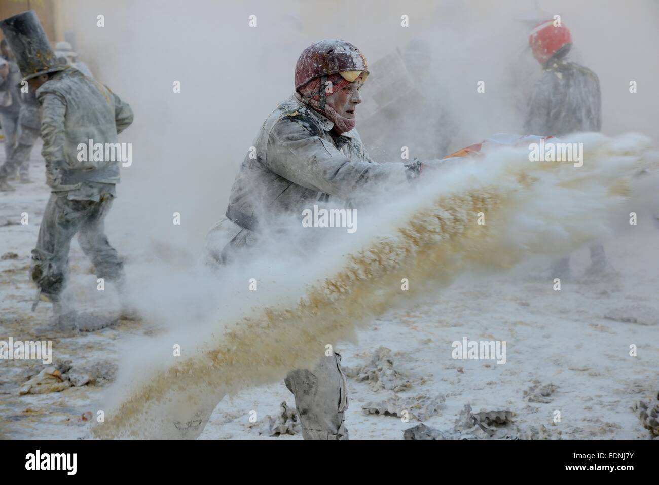 Els Enfarinats flour fight, rebels, armed with flour, eggs and firecrackers, take over the regiment of the city for one day Stock Photo