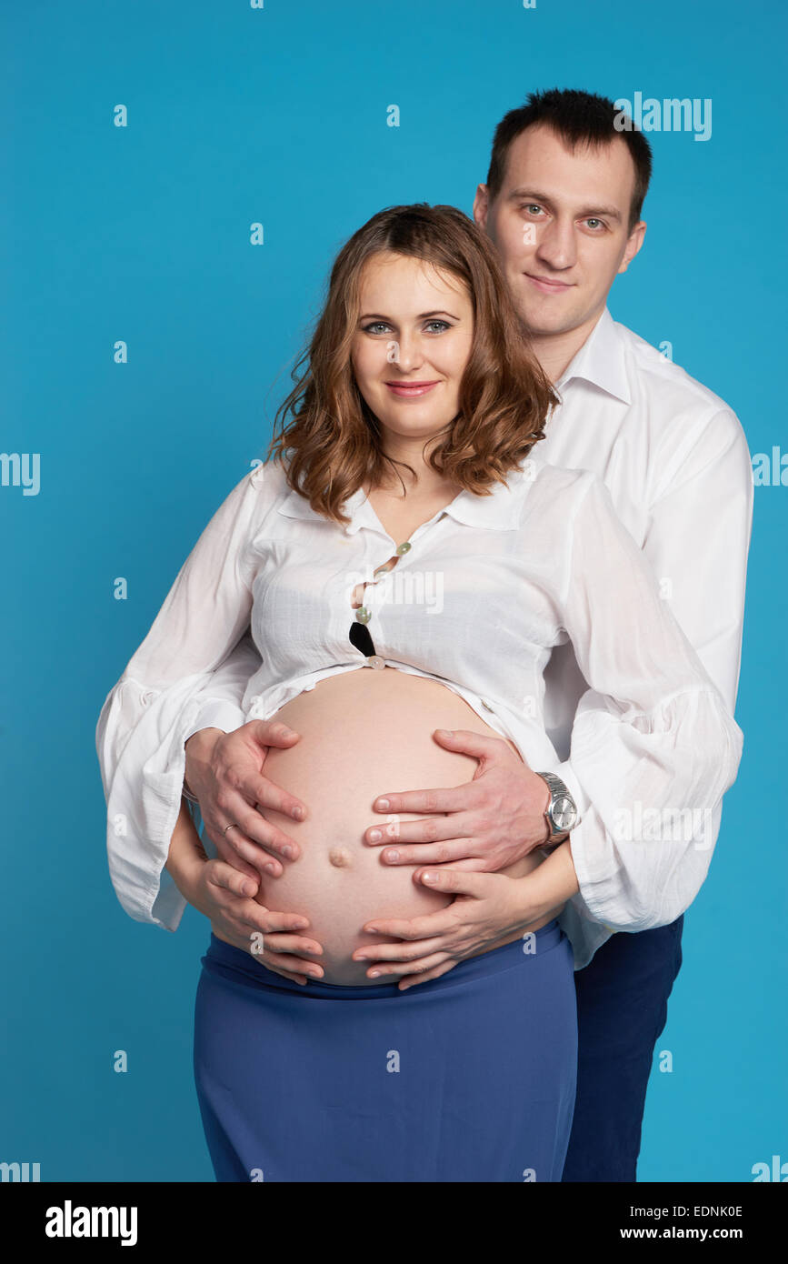 a man with a pregnant woman Stock Photo - Alamy