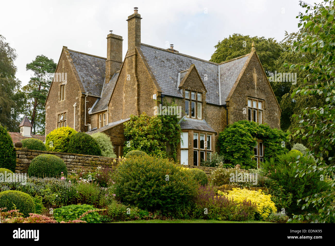 view of  old house and garden in Dorset countryside Stock Photo
