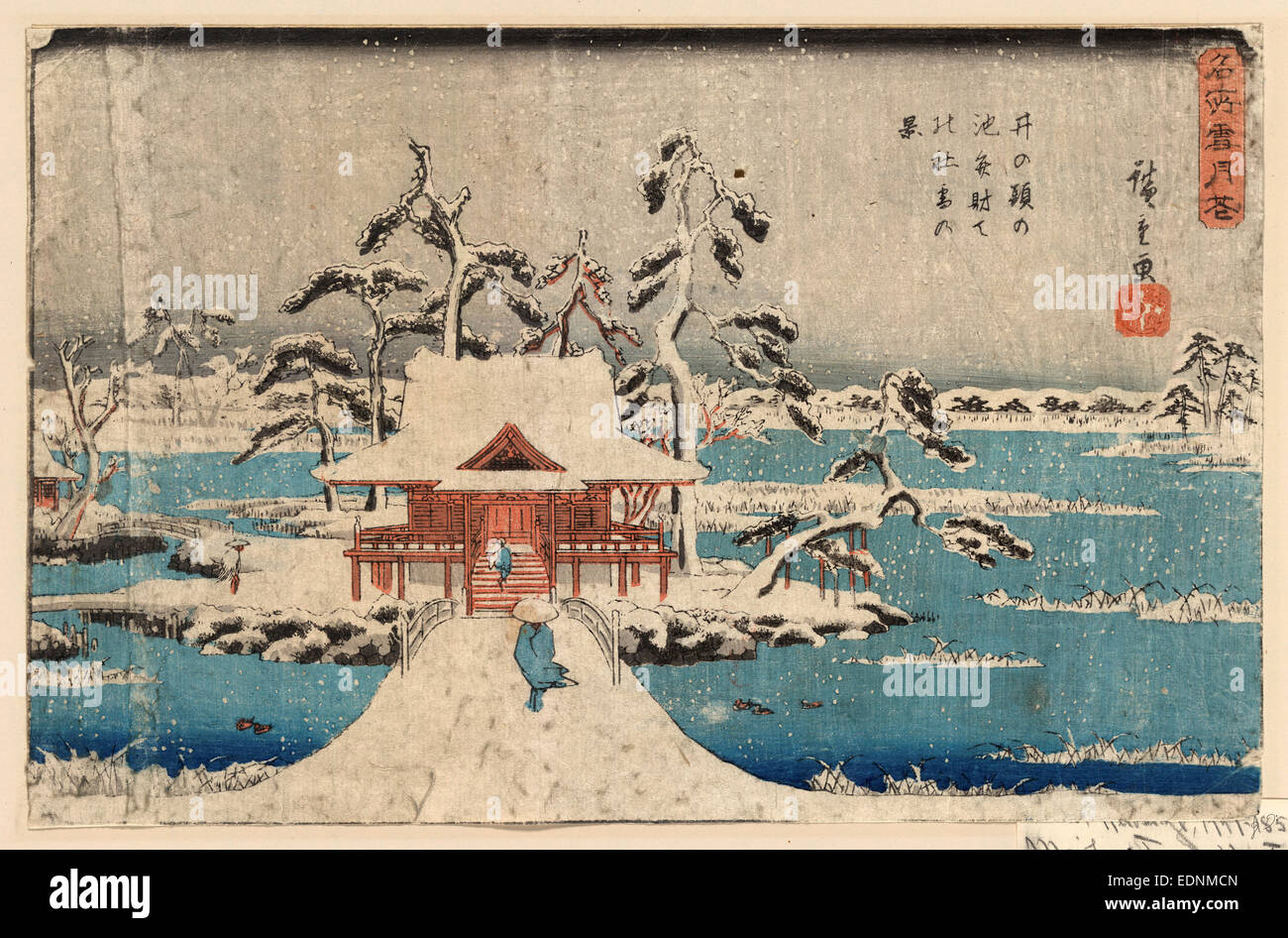Inokashira no ike benzaiten no yashiro, Snow scene of Benzaiten Shrine in Inokashira pond., Ando, Hiroshige, 1797-1858, artist, [between 1838 and 1844], 1 print : woodcut, color ; 22.1 x 34.2 cm., Print shows two people crossing a bridge to a building on a small island during a winter snowstorm. Stock Photo