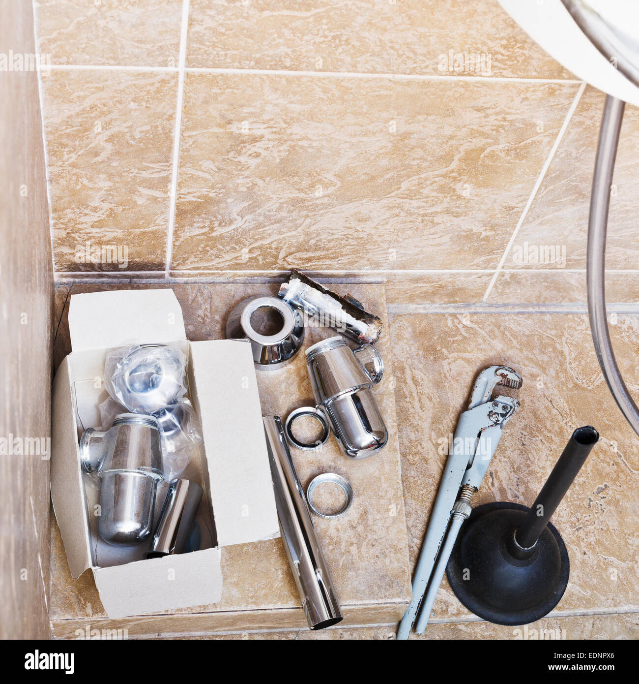 repairing of rusted sink siphon in bathroom at home Stock Photo