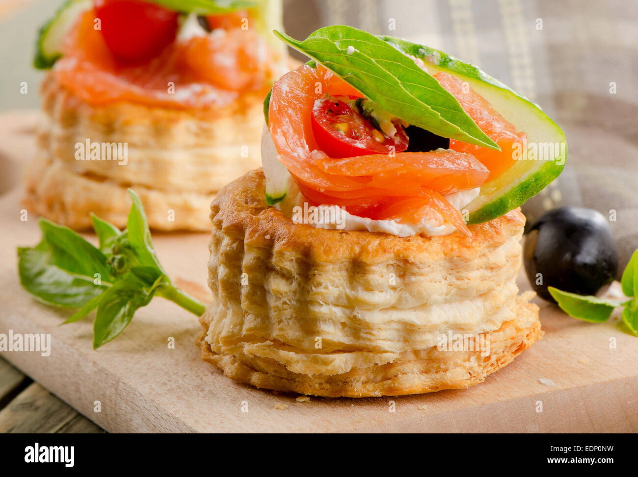 Canape with  salmon, cream cheese and vegetables. Selective focus Stock Photo