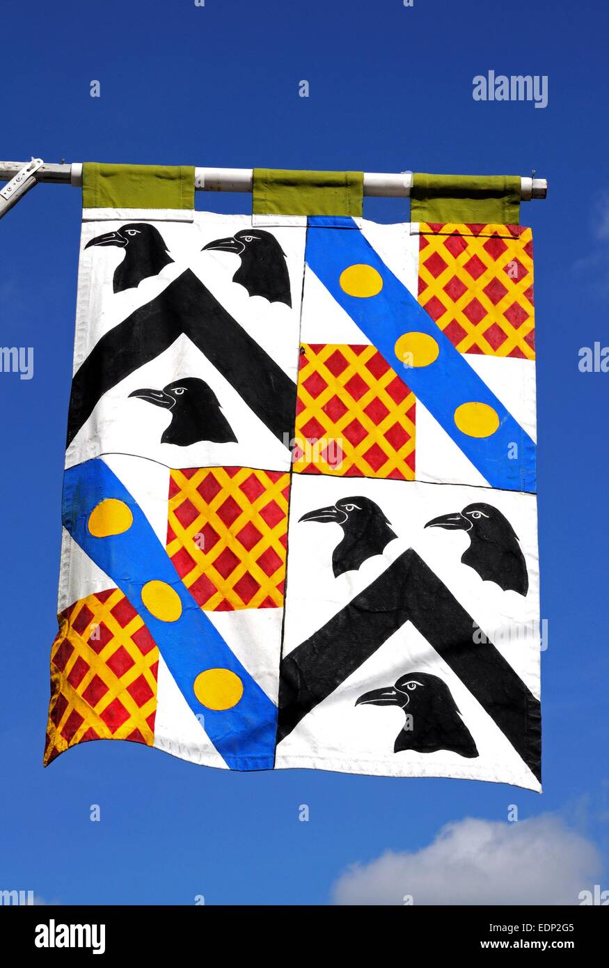 Medieval style flag with rooks against a blue sky, Tewkesbury, Gloucestershire, England, UK, Western Europe. Stock Photo