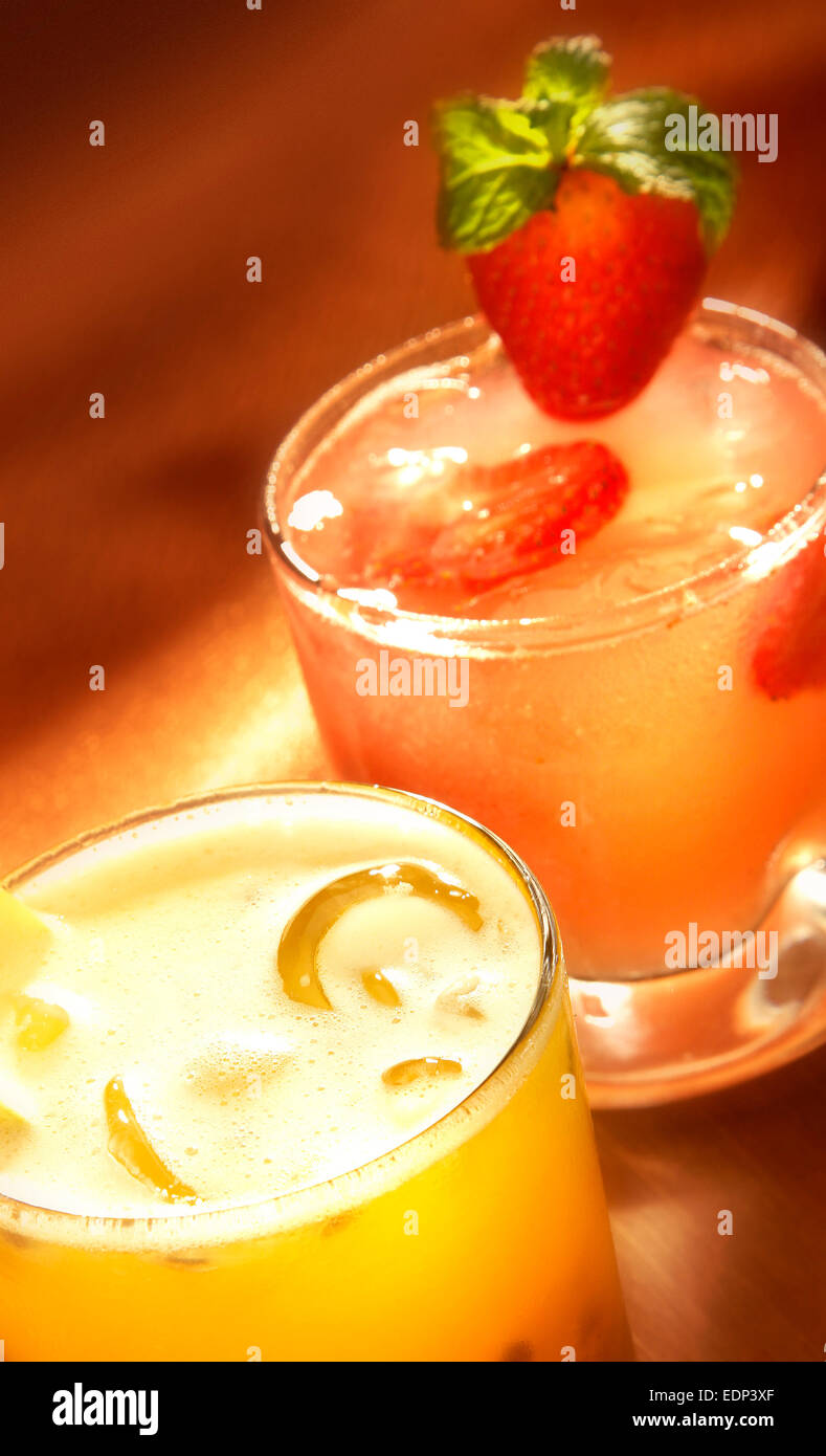 A well lit shot of Brazilian alcoholic drinks - caipirinhas mixed with fruit juices Stock Photo