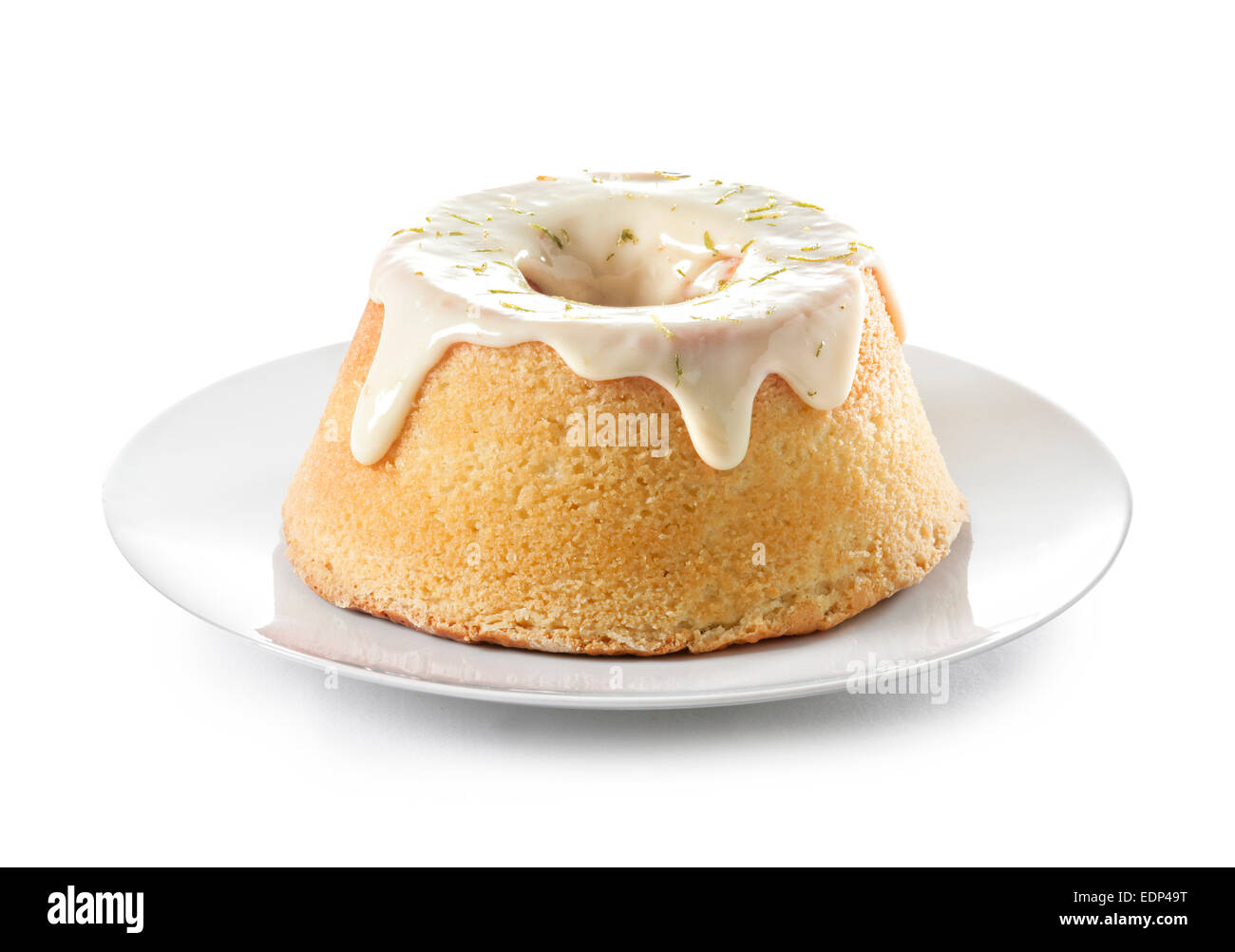 A lemon sponge cake with icing and lime rind Stock Photo Alamy