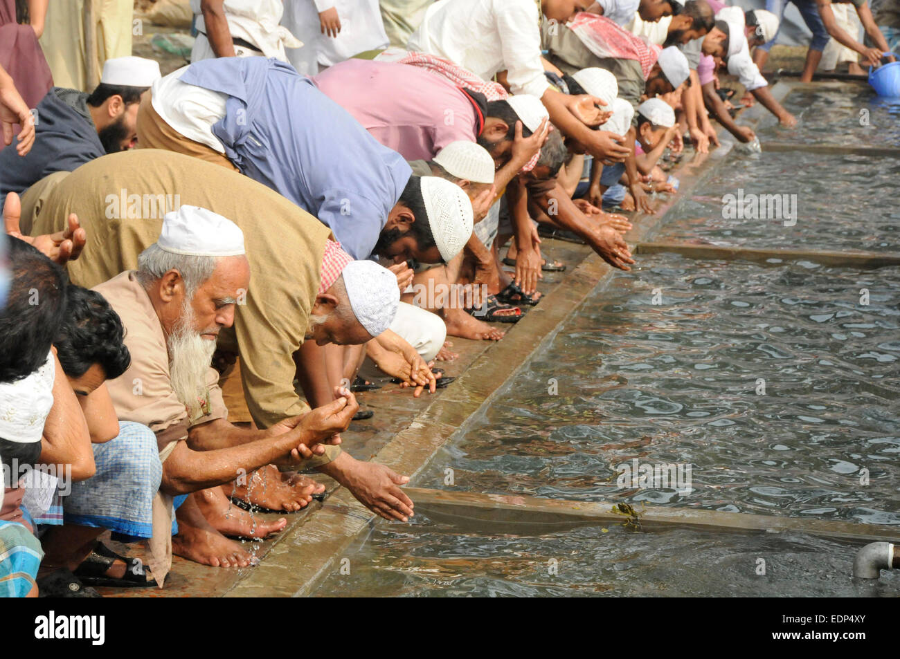 Dhaka, Bangladesh. 8th Jan, 2015. Muslims take fresh water as they ...