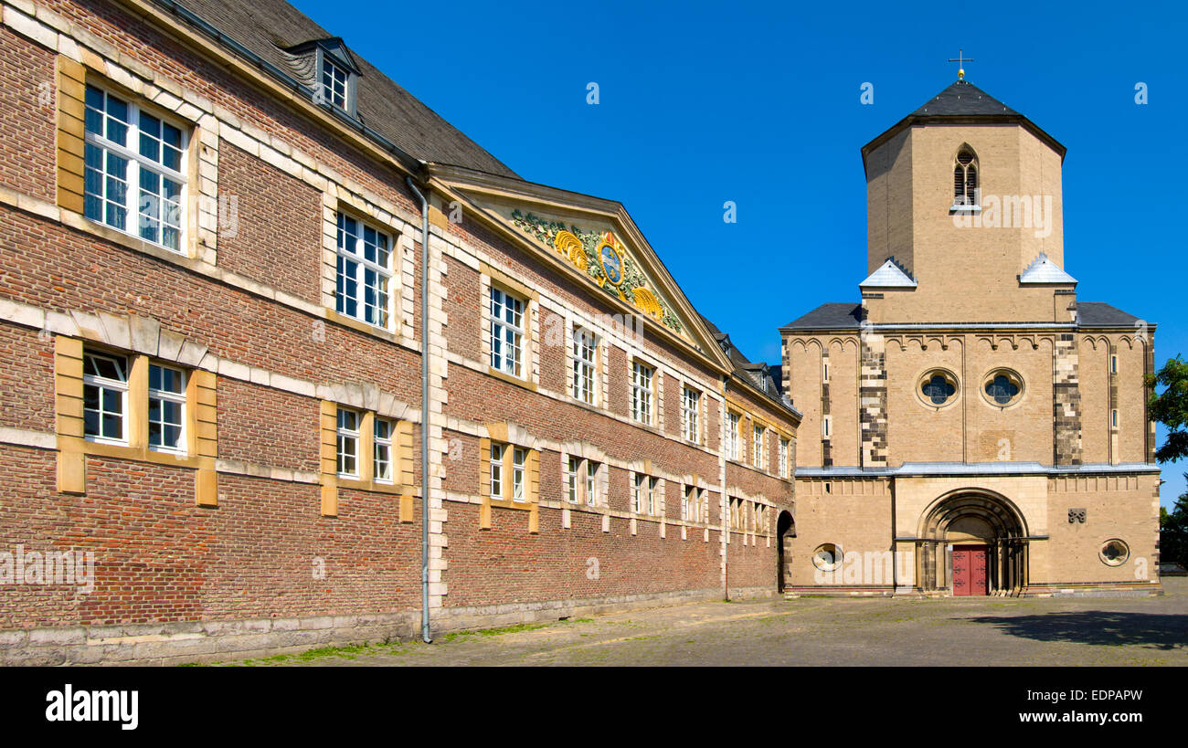 Moenchengladbach, North Rhein Westphalia, Germany. Munster (Benedictine Abbey; 13thC) and rear facade of the Town Hall (Rathaus Stock Photo