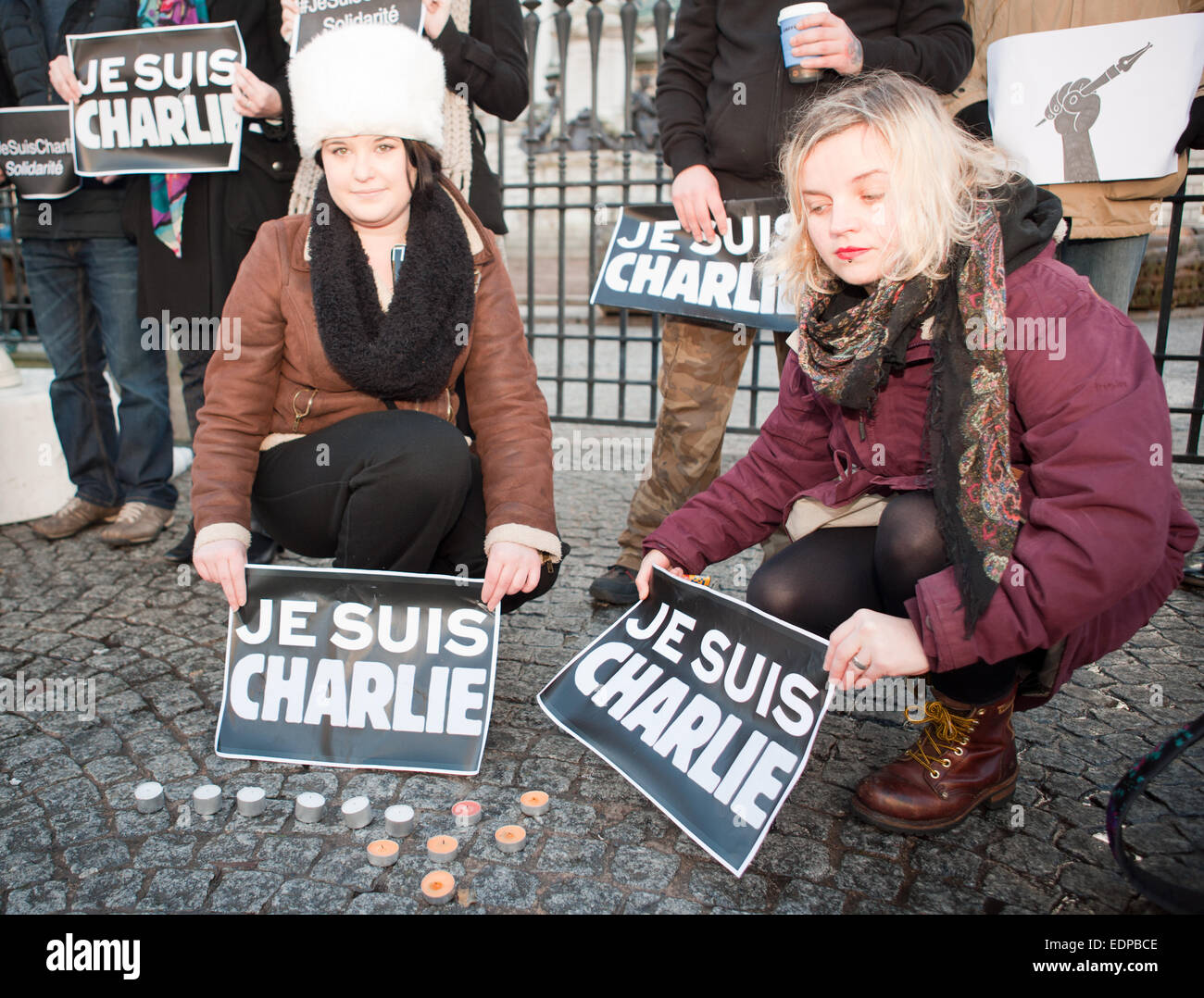 Belfast, UK. 8th January, 2015. Members of the NUJ and Amnesty International holding a Je Suis Charlie posters outside Belfast City Hall. the Silent Vigil was held in Remembrance of those killed in the Paris Attack Credit:  Bonzo/Alamy Live News Stock Photo