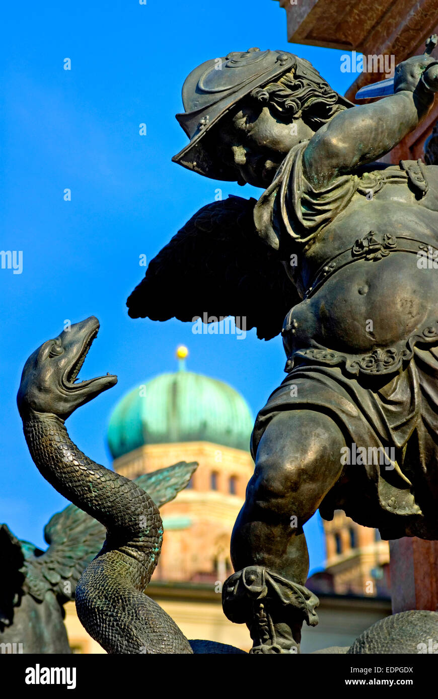 Munich, Bavaria, Germany. One of the Putti at base of the Mariensaule (1638) fighting snake / basilisk (symbolising unbelief) Stock Photo