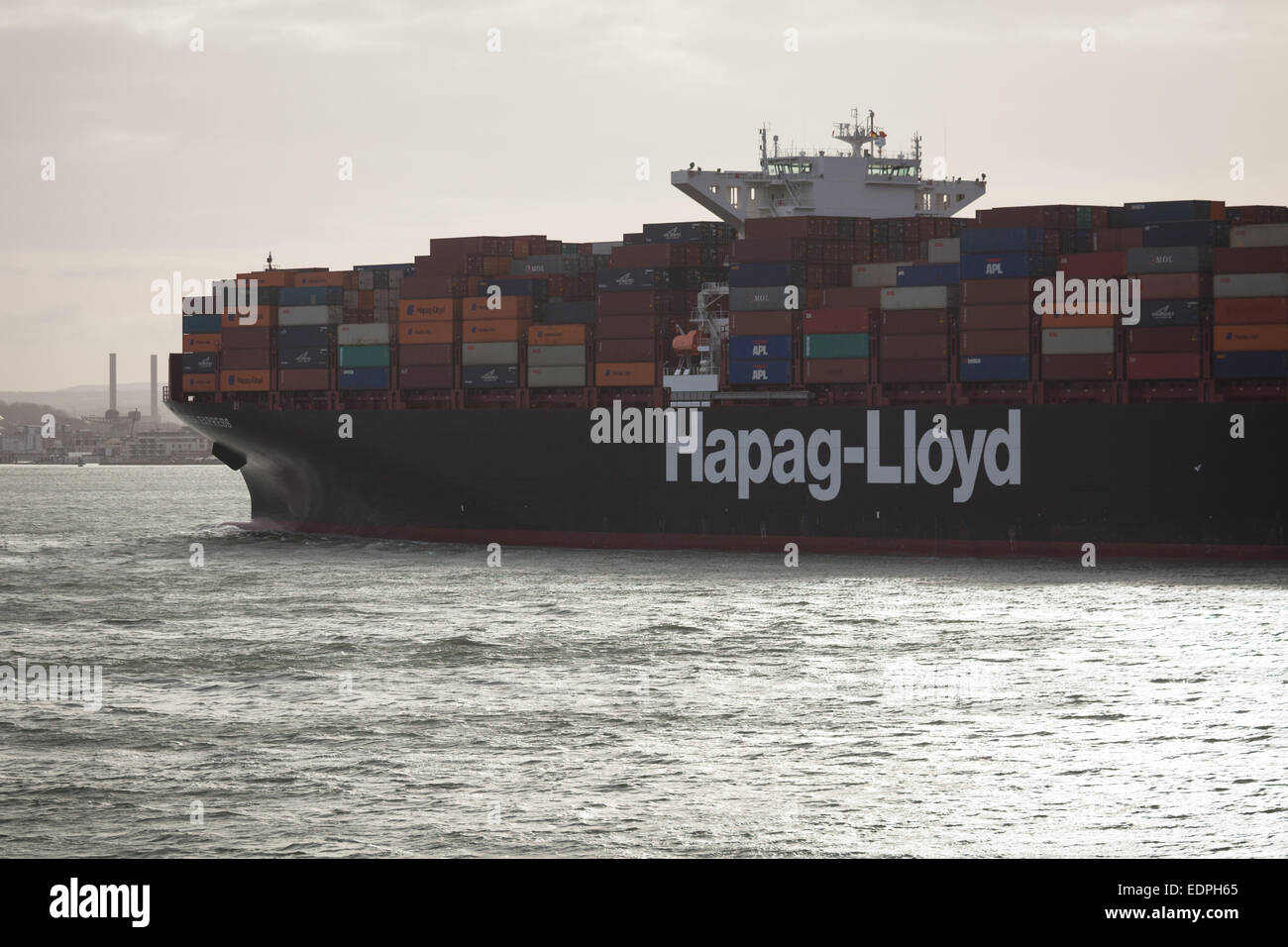 The Hapag-Lloyds cargo ship, Essen Express departing Southampton. Stock Photo
