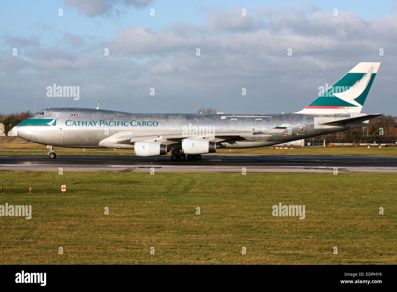 Cathay Pacific Cargo Boeing 747-400 accelerates down runway 23R at Manchester airport. Stock Photo