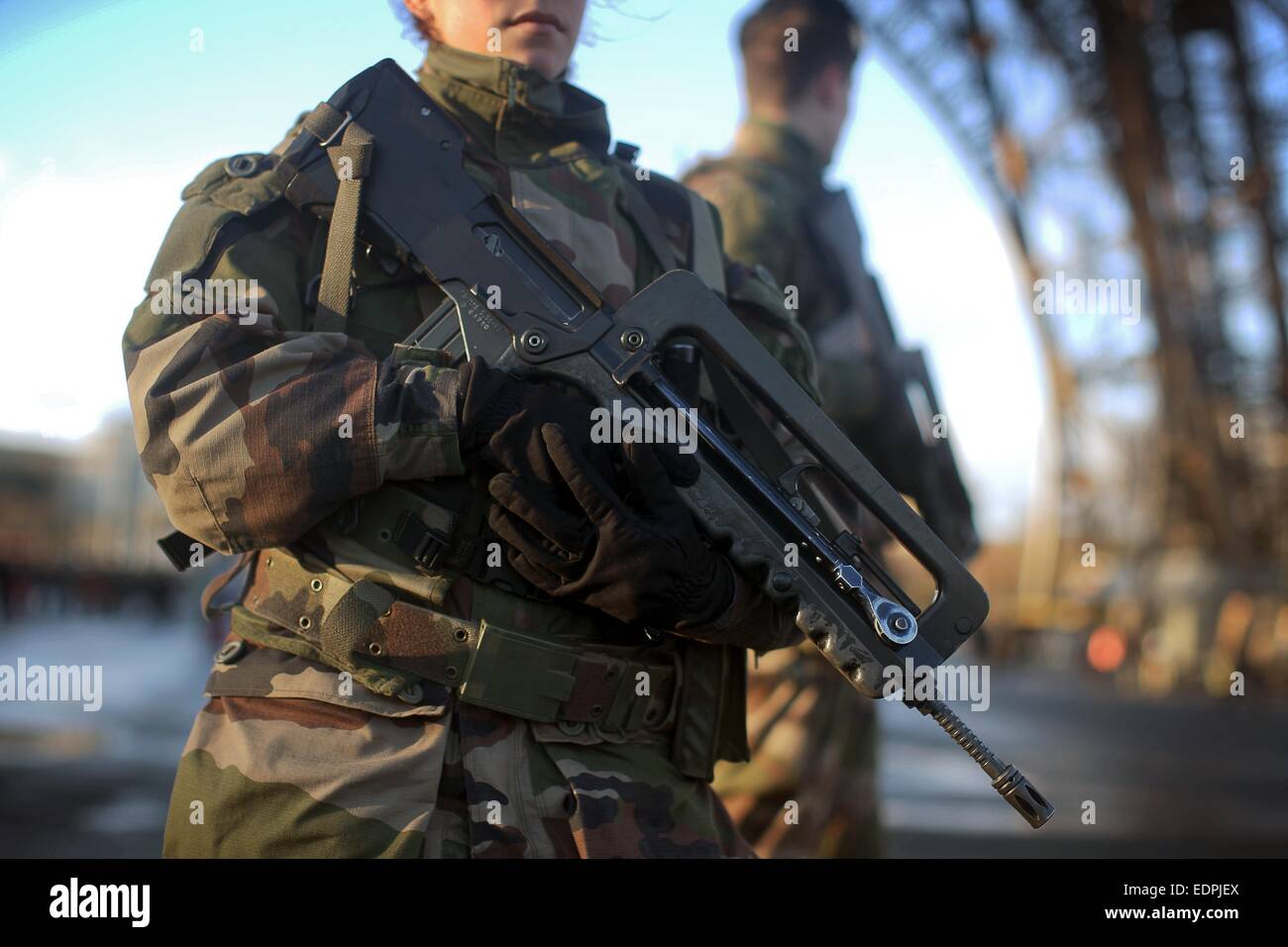 Paris, France. 8th Jan, 2015. Heavily armored soldiers guard the Eiffel Tower in Paris, France, 8 January 2015. PHOTO: Fredrik von Erichsen/dpa/Alamy Live News Stock Photo