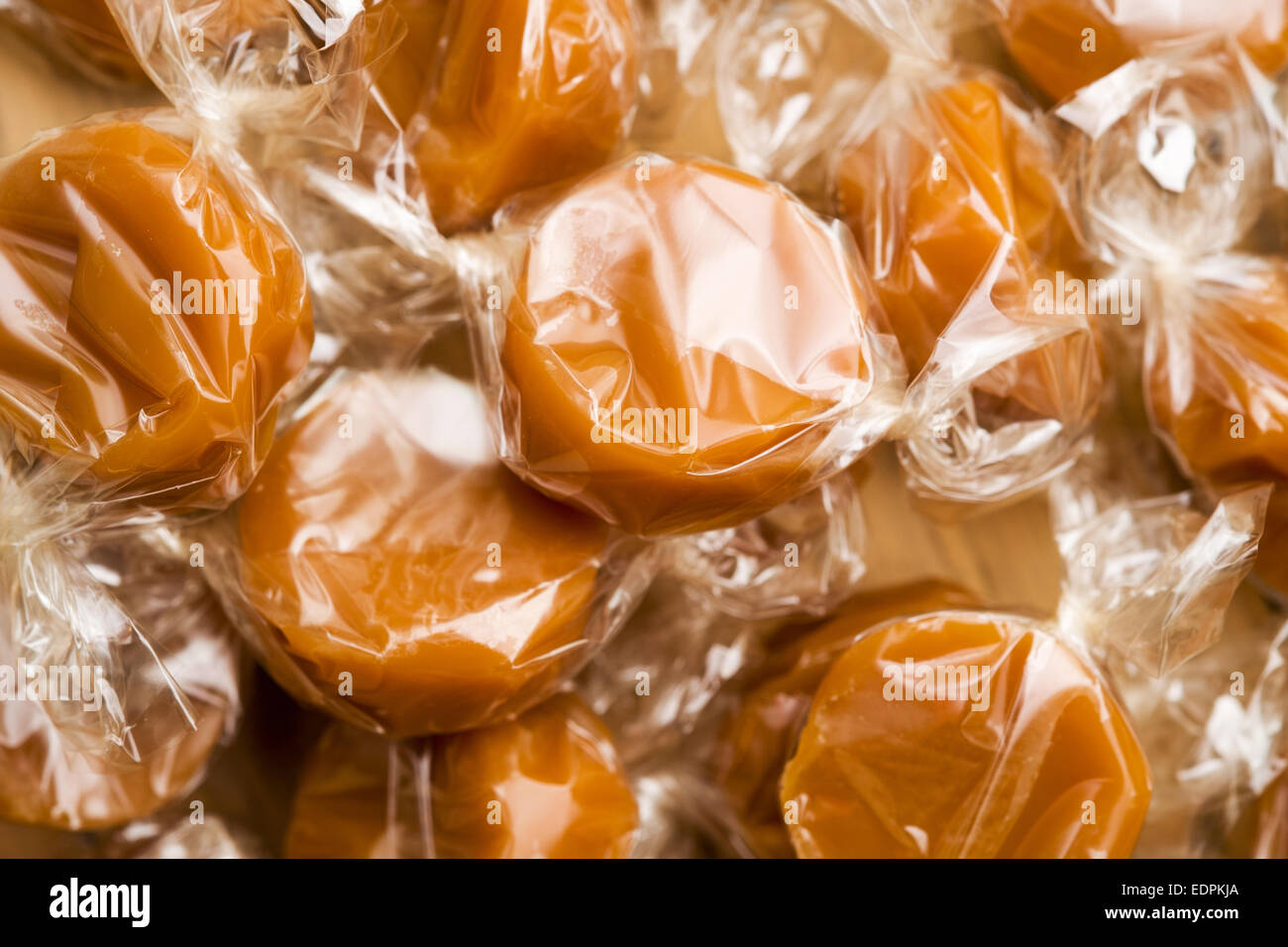 cellophane wrapped chewy dairy toffees Stock Photo Alamy