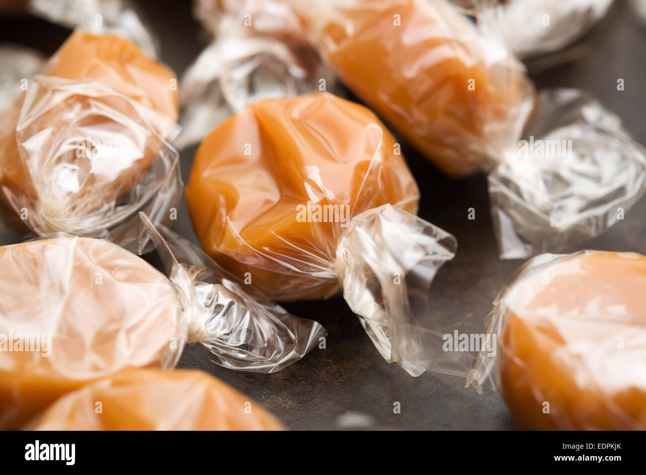 cellophane wrapped chewy dairy toffees Stock Photo