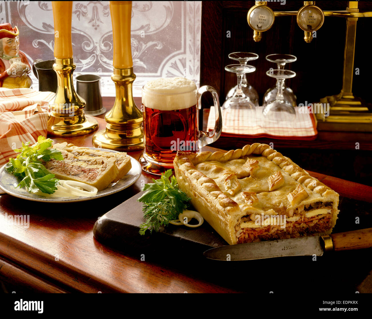 veal ham and egg pie & pint in pub Stock Photo
