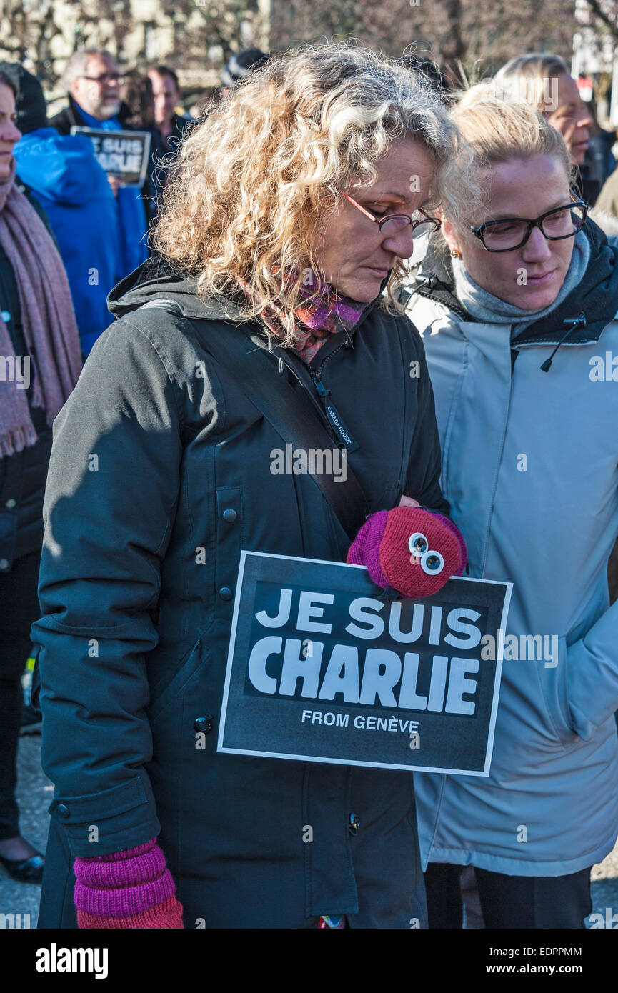 Geneva, Switzerland. 8th January 2015. Two women at a vigil in Geneva's Place de Neuve to show solidarity with the victims of the attack against Charlie Hebdo. Credit:  Alistair Scott/Alamy Live News Stock Photo