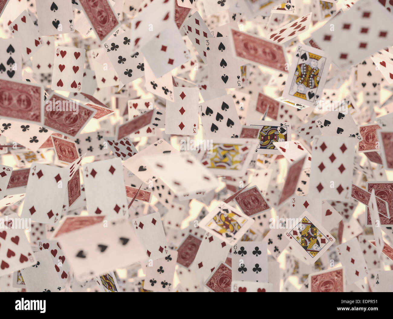 Several playing cards flying with depth of field. Stock Photo