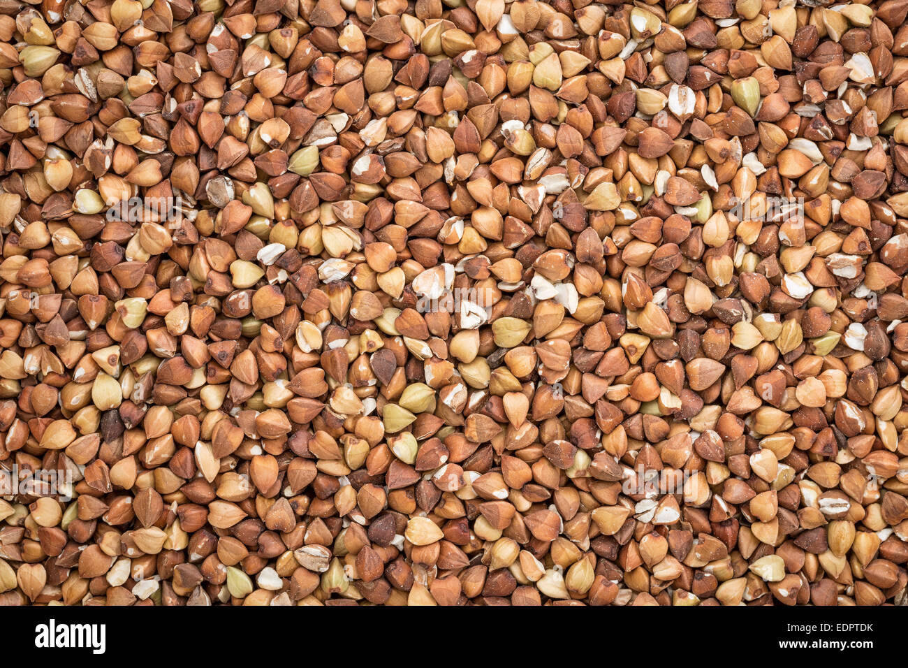 background and texture of roasted buckwheat kasha gluten free grain