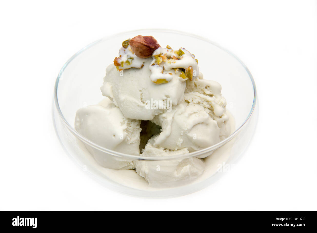 Vanilla ice cream ball with pieces of pistachio(clipping path Stock Photo -  Alamy