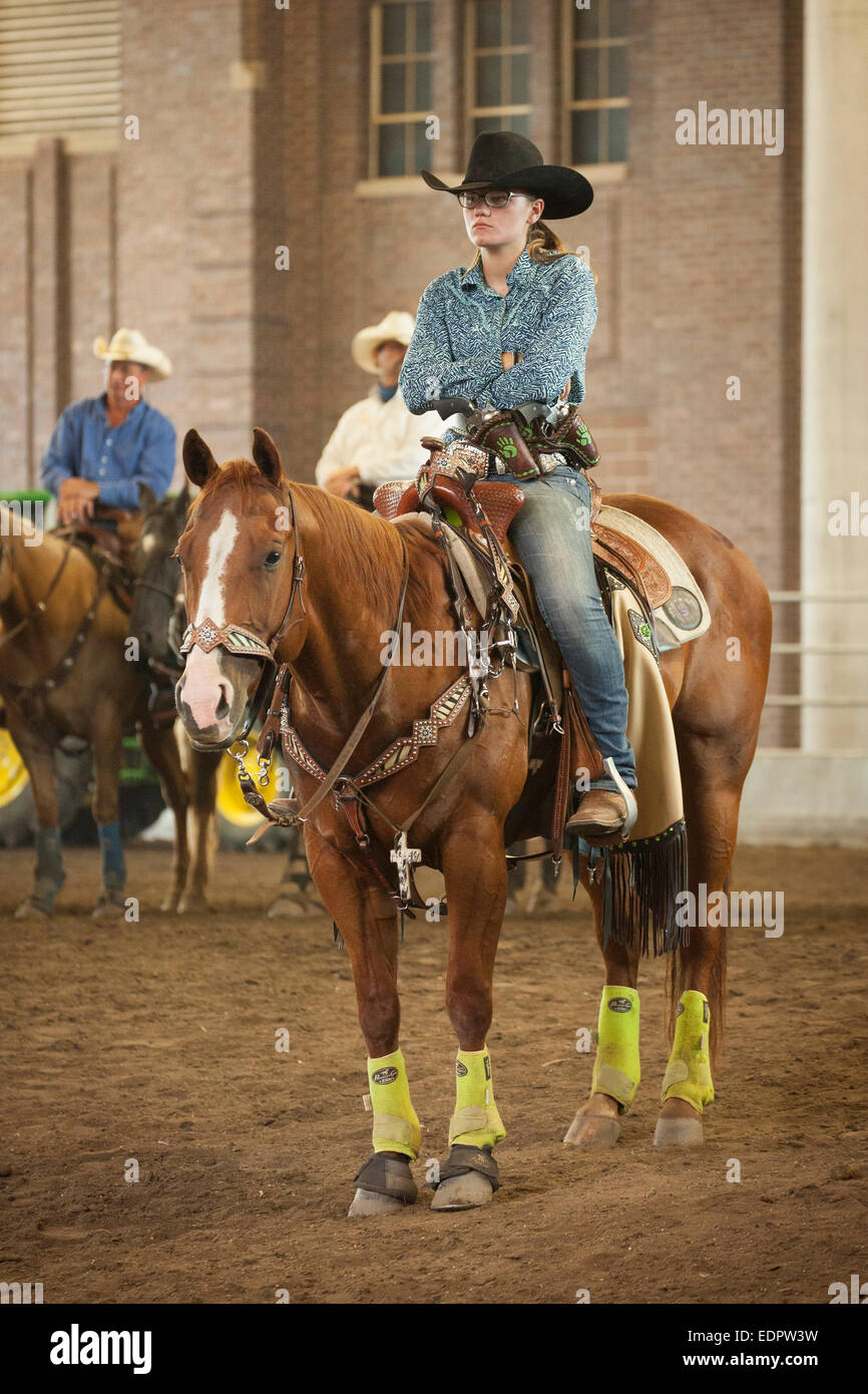 Girl sitting on her horse prior to the shooting competition. Iowa State