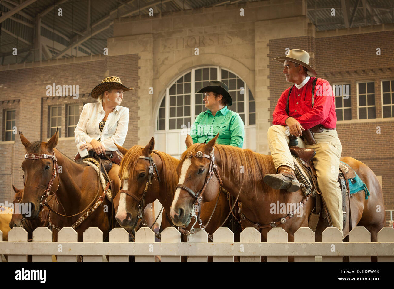 Competitors talking during break at the cowby mounted shooting