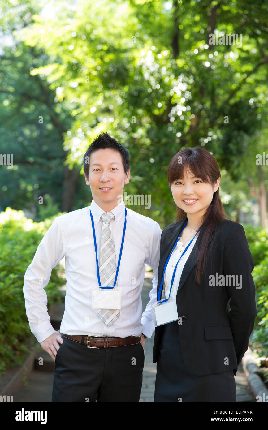 Smiling Business People Looking at Camera Stock Photo