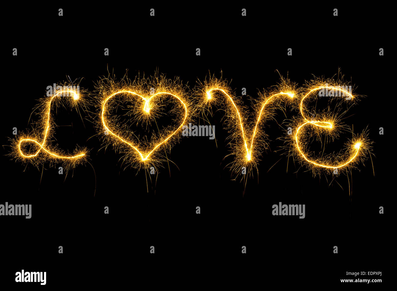Sparking love word on black background Stock Photo