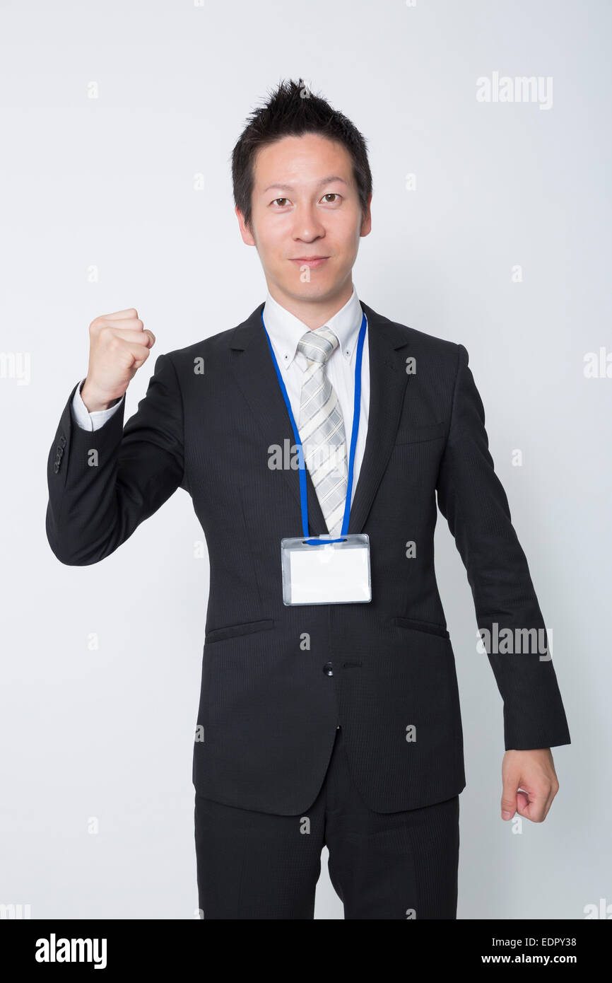 Businessman Clenching His Fist Stock Photo