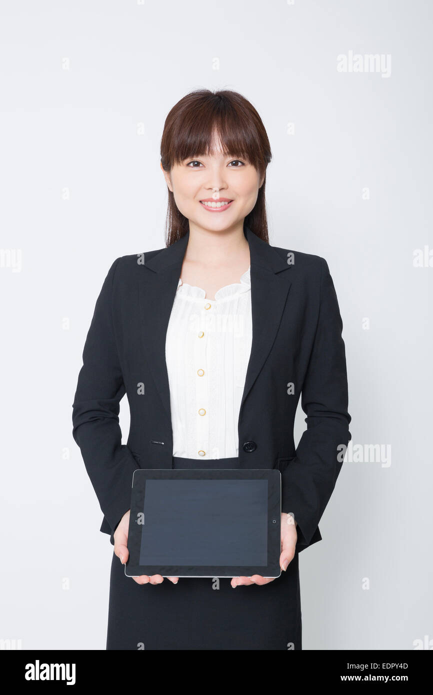Businesswoman Holding Tablet Computer Stock Photo