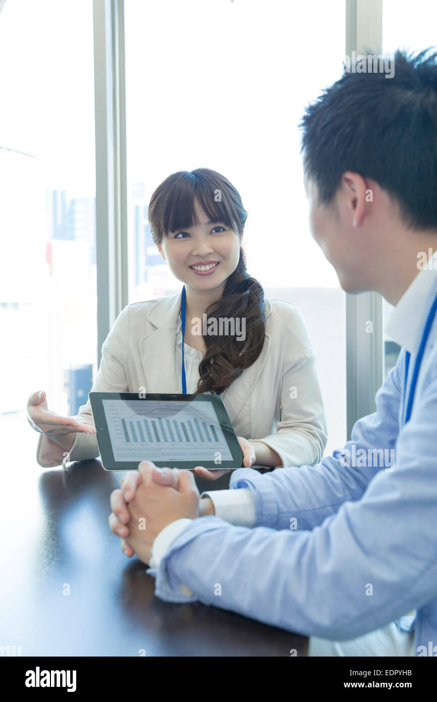 Two Business People in Meeting Stock Photo